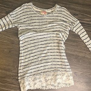 White and black sweater very nice